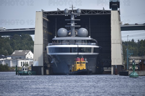 The new superyacht COSMOS leaves the Lürssen shipyard near Rendsburg for the Kiel Canal, Kielkanal, Kiel Canal, Schleswig-Holstein, Germany