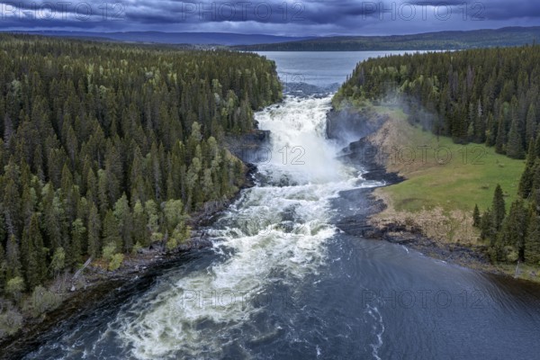 Aerial view over the Tännforsen falls in spring near Åre on the Indalsälven River, Sweden's largest waterfall in Jämtland, Scandinavia