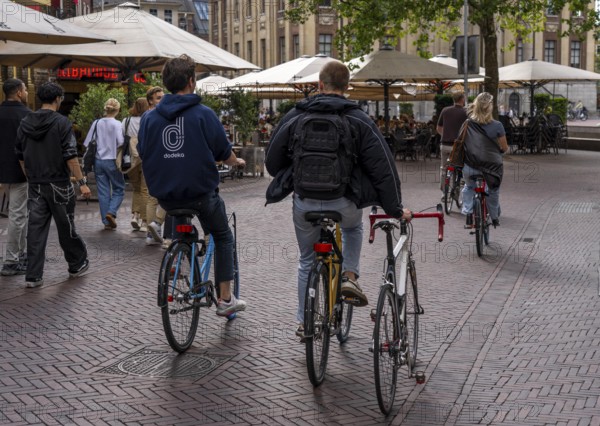 Bicycle traffic in Groningen, second bicycle carried, Netherlands
