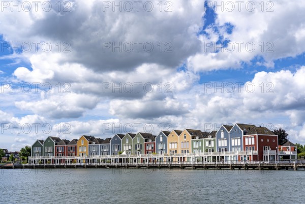 Small town of Houten near Utrecht, bicycles have priority in the town of 50, 000 inhabitants, generous cycle paths, many leisure areas, water areas, living by the water