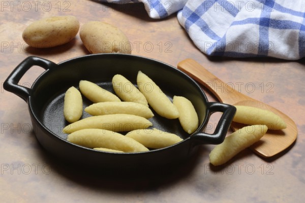 Raw Schupfnudeln in pan, type of pasta, Germany