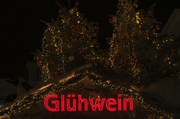 Night view, Glühwein lettering on Christmas stand, Christmas market, Stuttgart, Baden-Württemberg, Germany