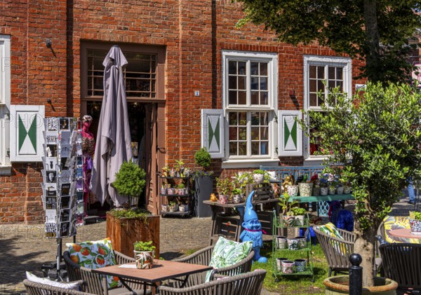 Catering, retail and typical, historic architecture in the Dutch Quarter in Potsdam, Brandenburg, Germany