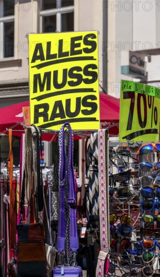 Retail trade with signs for price reductions and discounts, Potsdam, Brandenburg, Germany