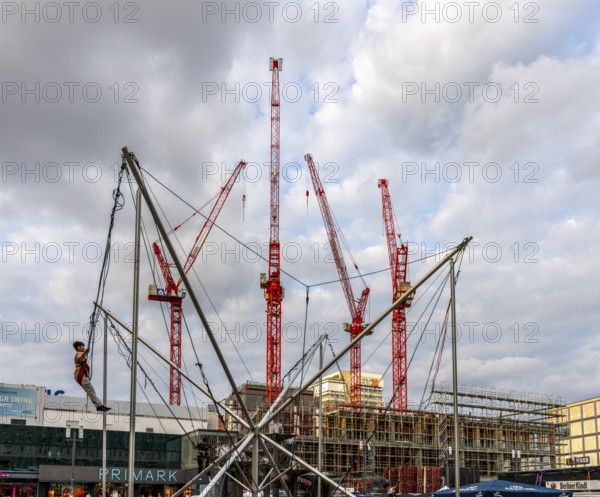 Play scaffolding with jump ropes, construction cranes at Alexanderplatz, Berlin, Germany