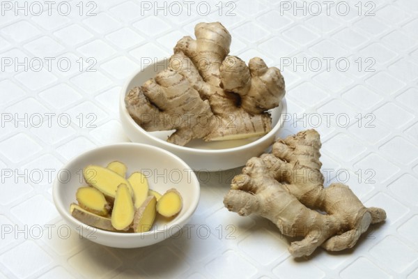 Ginger, ginger tubers and ginger slices in shell