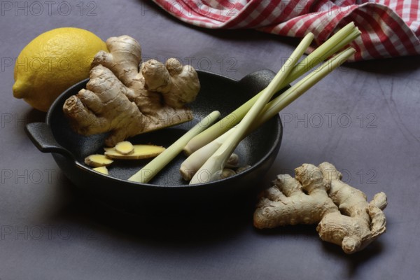 Ginger, ginger root and lemongrass in pot