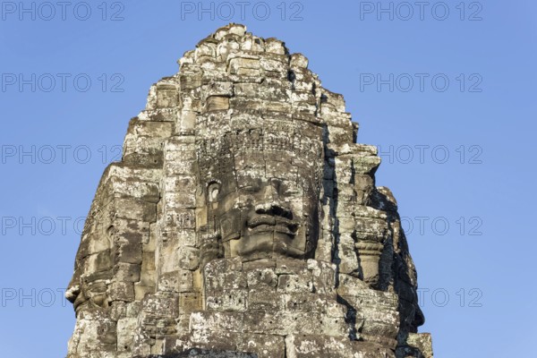 Huge stone-carved face of Bodhisattva Lokeshvara, also Avalokiteshvara, Bayon Temple, Angkor Thom, UNESCO World Heritage Site, Angkor Wat, Siem Reap, Cambodia
