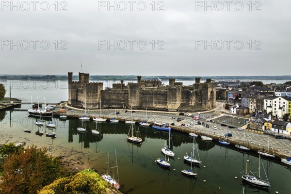 Caernarfon Castle from a drone, Caernarfon, Gwynedd, North-West Wales, UK