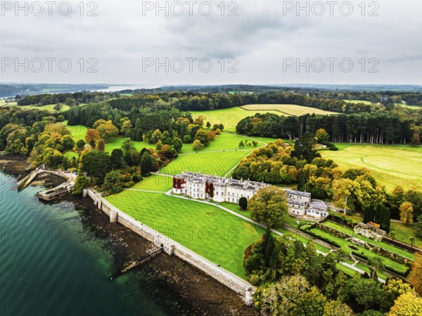 Autumn over Plas Newydd House from a drone, Gardens and Parkland, Llanfairpwllgwyngyll, Anglesey, Wales, UK