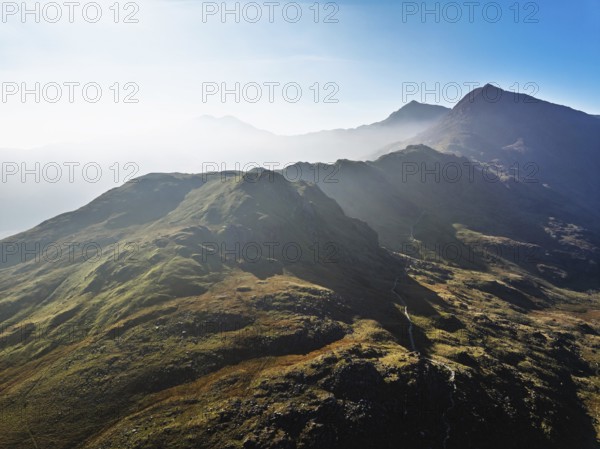 DefaultAutumn colours of Pen-y-Pass over Miner's Track, Start Point and road A4086 from a drone, Snowdonia, Wales, UK