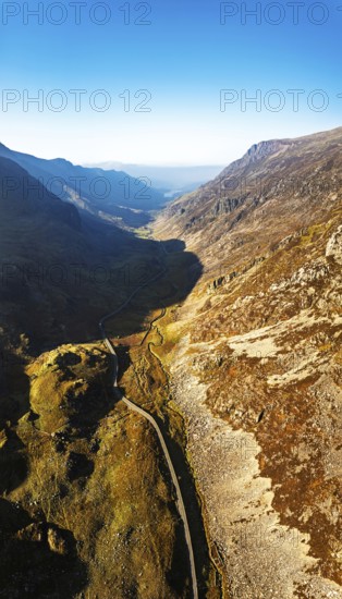 Autumn colours of Pen-y-Pass over Miner's Track, Start Point and road A4086 from a drone, Snowdonia, Wales, UK
