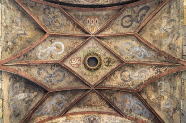 Coat of arms on the Gothic Old Town Bridge Tower in Prague, Czech Republic