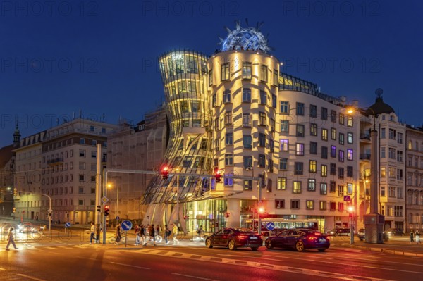 The Dancing House of architects Vlado Milunic and Frank Gehry at dusk, Prague, Czech Republic