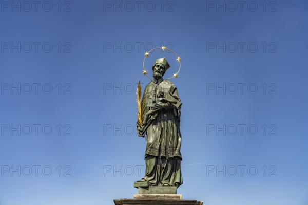 Saint John Nepomuk on Charles Bridge in Prague, Czech Republic