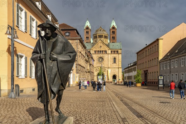 Sculpture of a Saint James Pilgrim on Maximilianstraße and Speyer Cathedral in Speyer, Rhineland-Palatinate, Germany