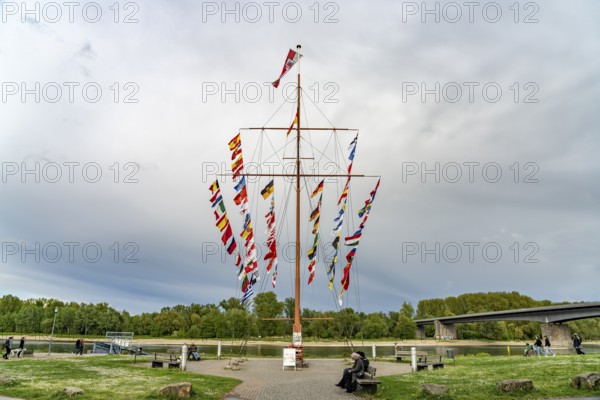 Flag pole on the Helmut-Kohl-Ufer Rhine promenade in Speyer, Rhineland-Palatinate, Germany