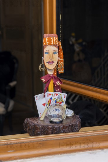 Window decoration at the entrance of a fortune teller, horoscope