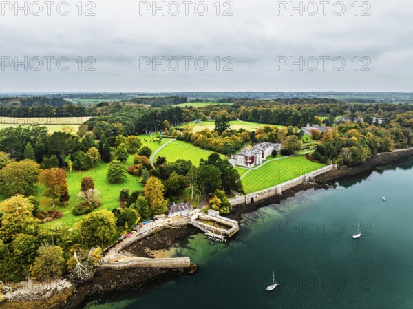 Autumn over Plas Newydd House from a drone, Gardens and Parkland, Llanfairpwllgwyngyll, Anglesey, Wales, UK