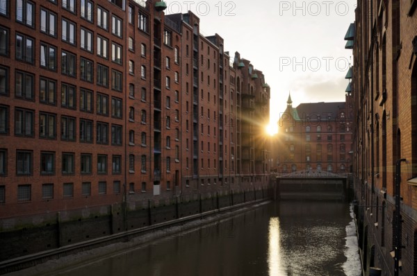 Warehouses, façade, brick building, Hamburger Speicherstadt, Hafencity, canal, sunset, evening mood, atmospheric, Free and Hanseatic City of Hamburg, Germany