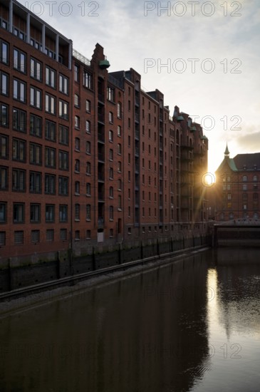 Warehouses, façade, brick building, Hamburger Speicherstadt, Hafencity, canal, sunset, evening mood, atmospheric, Free and Hanseatic City of Hamburg, Germany