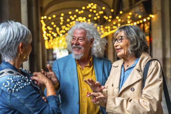 Three senior friends enjoying a lively conversation under decorative lights, sharing laughter and positive energy while socializing in an urban setting