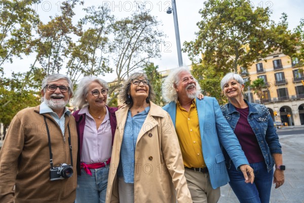 Group of smiling multi ethnic senior friends embracing, walking, and enjoying a sightseeing trip in a european city, celebrating friendship and active retirement