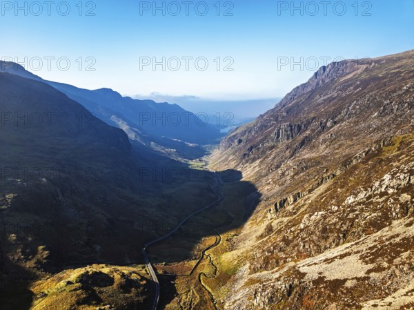 Autumn colours of Pen-y-Pass over Miner's Track, Start Point and road A4086 from a drone, Snowdonia, Wales, UK