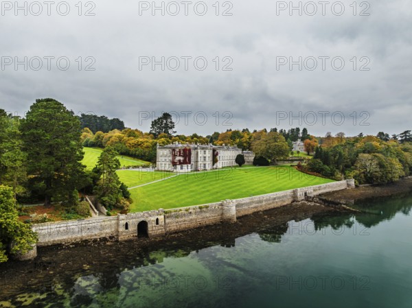 Autumn over Plas Newydd House from a drone, Gardens and Parkland, Llanfairpwllgwyngyll, Anglesey, Wales, UK