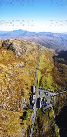 Autumn colours of Pen-y-Pass over Miner's Track, Start Point and road A4086 from a drone, Snowdonia, Wales, UK