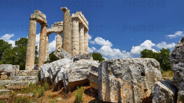 Ancient columns and ruins under a clear blue sky, Nemea, Ancient Zeus Heightum, Archaeological Site, Peloponnese, Greece