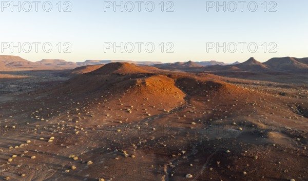 Aerial view, evening mood, hills and dry landscape near Palmwag, Kunene region, Namibia