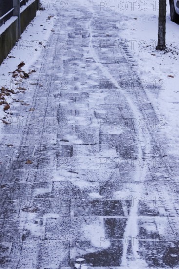 Winter, slippery roads with snow and ice, footpath, slippery roads, Germany