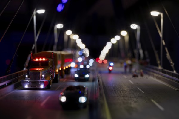 Interior view, replica of Köhlbrand Bridge in Hamburg, cars crossing bridge, miniature illustration, night view, Miniature Wonderland, Free and Hanseatic City of Hamburg, Germany