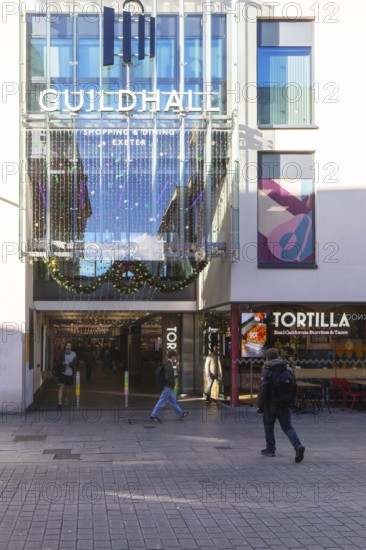 Shoppers at Guildhall shopping centre mall in city centre, Exeter, Devon, England, UK