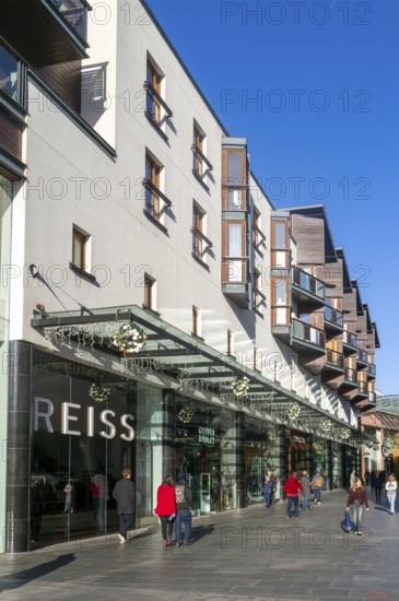 Shoppers walking past Reiss shop store in city centre, Princesshay, Exeter, Devon, England, UK
