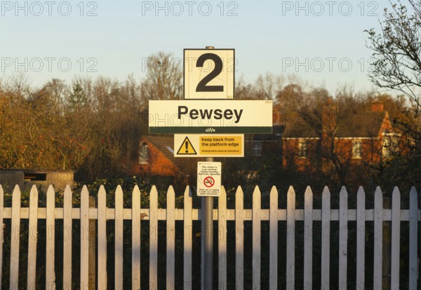 Platform 2 sign in winter morning sunshine, Pewsey railway station, Wiltshire, England, UK