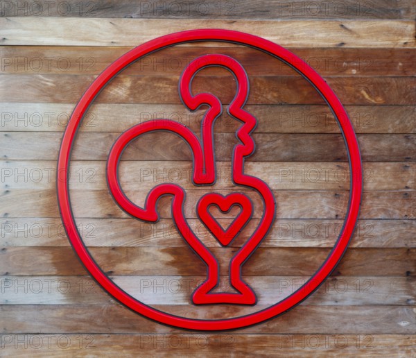 Nando's fast-food restauarnt logo symbol red cockerel heart, Exeter, Devon, England, Uk