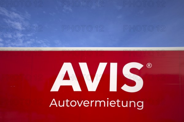 Lettering, logo, car rental AVIS on truck, sky behind, blue, Free and Hanseatic City of Hamburg, Germany