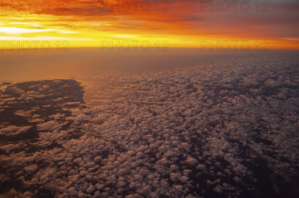 View from airplane window at sunrise