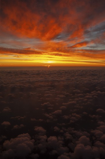 View from airplane window at sunrise