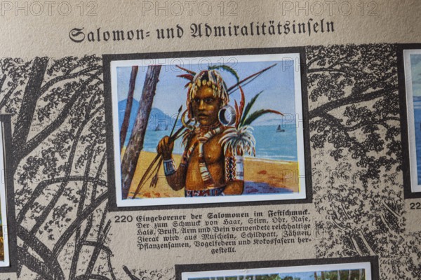 German colonies. Solomon and Admiralty Islands. Solomon Islands native in festive decoration. An anthology published by Cigaretten-Bilderdienst Dresden from 1936. Germany