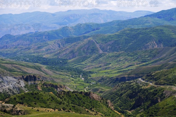 Scenic view of mountains and valleys, green hills, blue sky in the background, view from Vardenyats Pass or Selim Pass, Vayots Dzor Province, Armenia