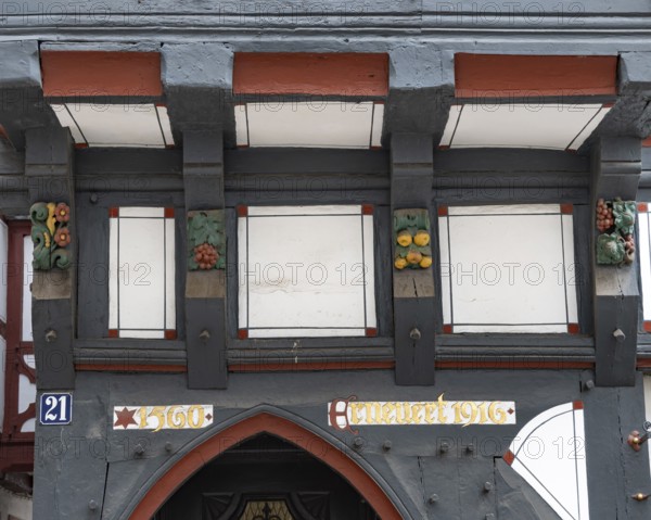 Decoration on half-timbered house, former press house, market, Oberstadt, Marburg, Hesse, Germany
