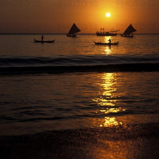 Fishing boats in Jimbaran Bay at sunset, Bali, Indonesia