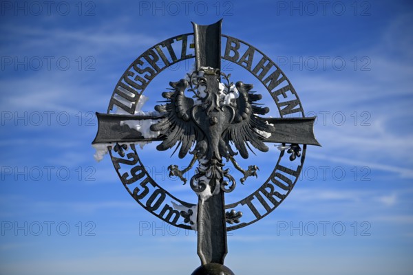 Cross at the mountain station of the Zugspitz cable car, Austrian side, municipality of Ehrwald, Reutte district, Tyrol, Austria