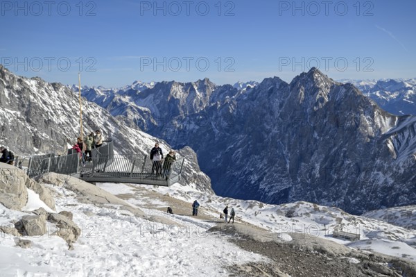 Tourists on a viewing platform on Zugspitzplatt, Grainau municipality, Garmisch-Partenkirchen district, Bavaria, Germany