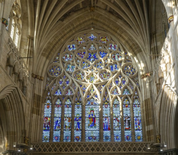 Stained glass of the west window inside Exeter cathedral church, Exeter, Devon, England, UK