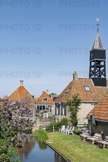 Gracht, canal in Hindeloopen, Friesland, Netherlands