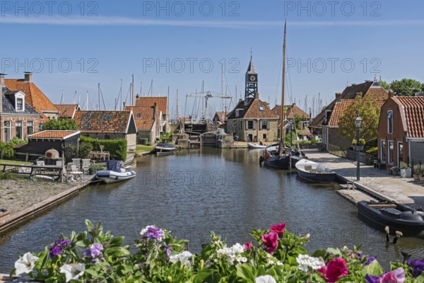 Gracht, canal with the lock keeper's house, Hindeloopen, Friesland Province, Netherlands